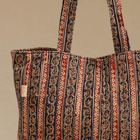 Handcrafted quilted kalamkari block printed fabric tote bag