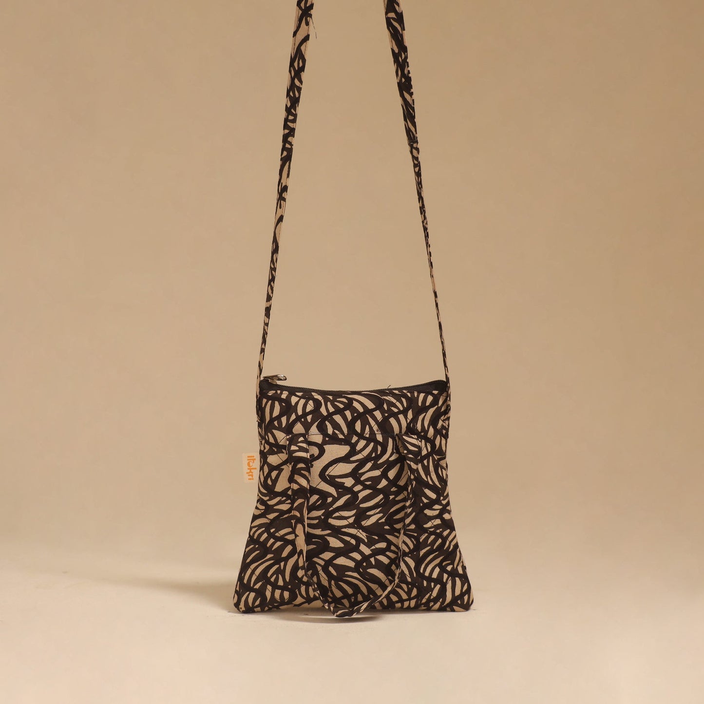 Handcrafted quilted sling bag 10