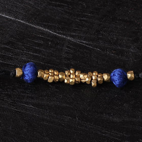Handcrafted tribal dokra brass thread rakhi 39