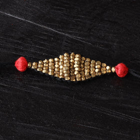 Handcrafted tribal dokra brass thread rakhi 49