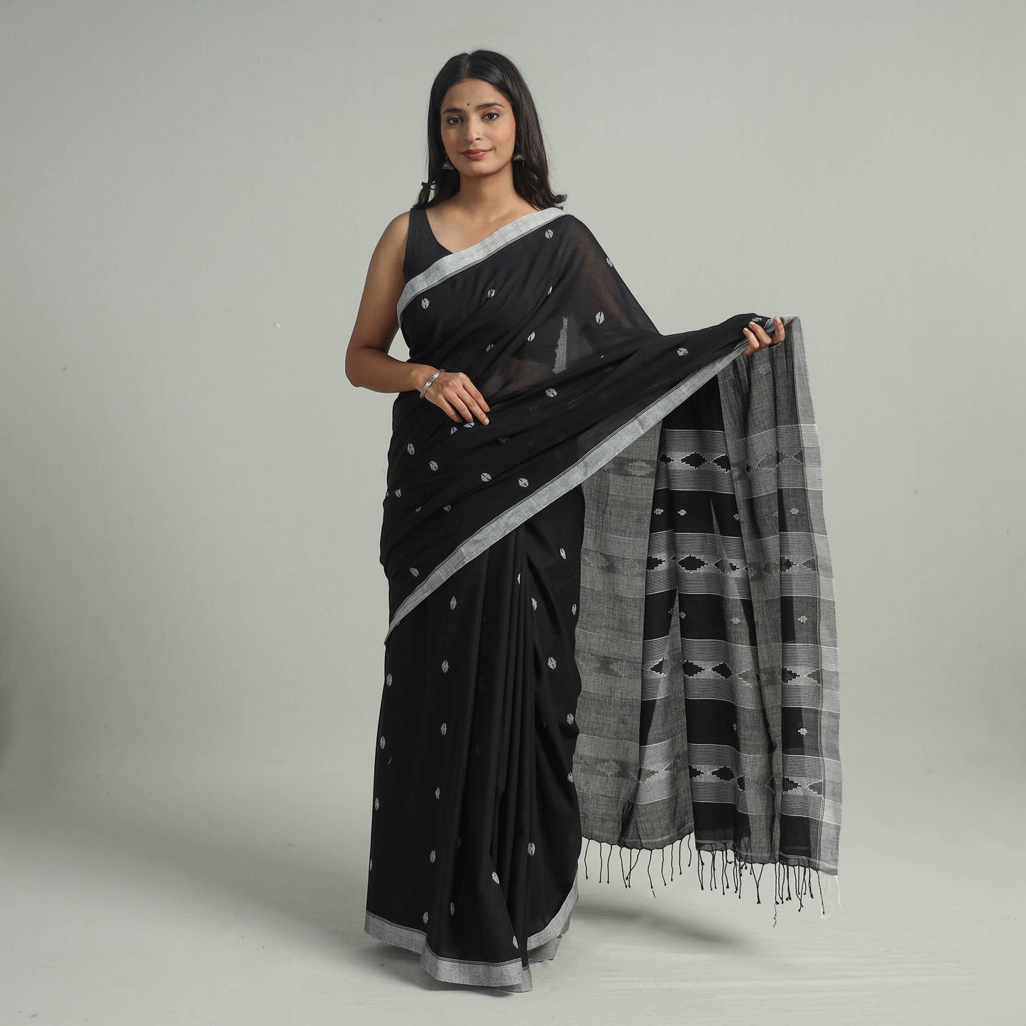 Black - handloom cotton phulia jamdani saree with tassels