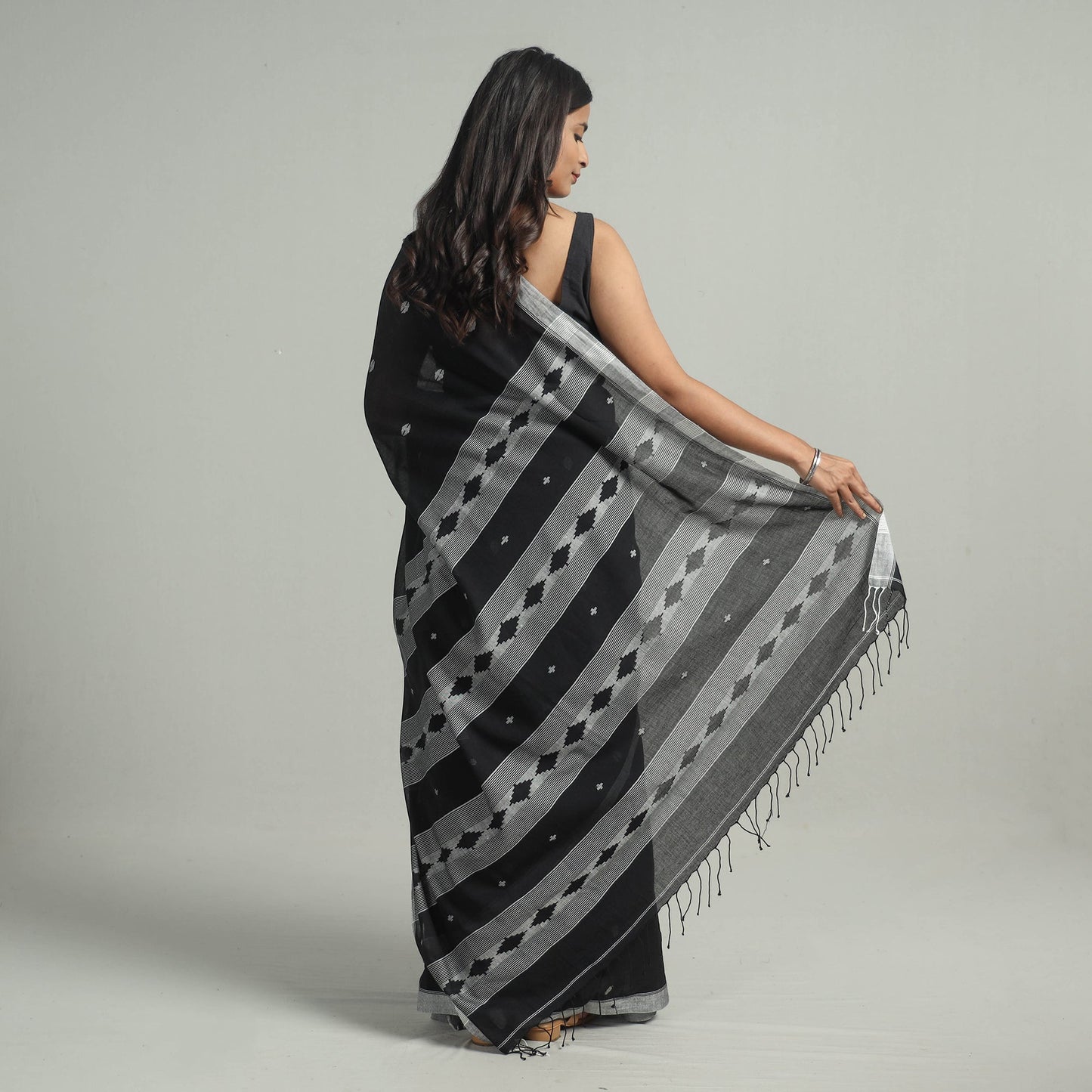 Black - handloom cotton phulia jamdani saree with tassels