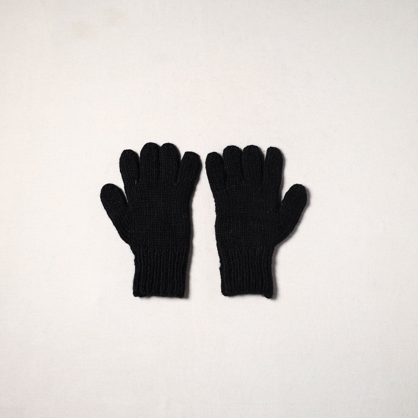 Black - kullu karishma hand knitted merino wool gloves