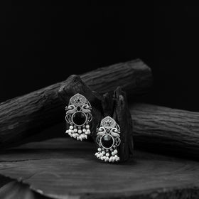 Black - saanjh bela flower & peacock oxidised earrings