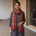 Red Block Print Woolen Ajrakh Stole, worn by a woman, AI visual of the stole, iTokri