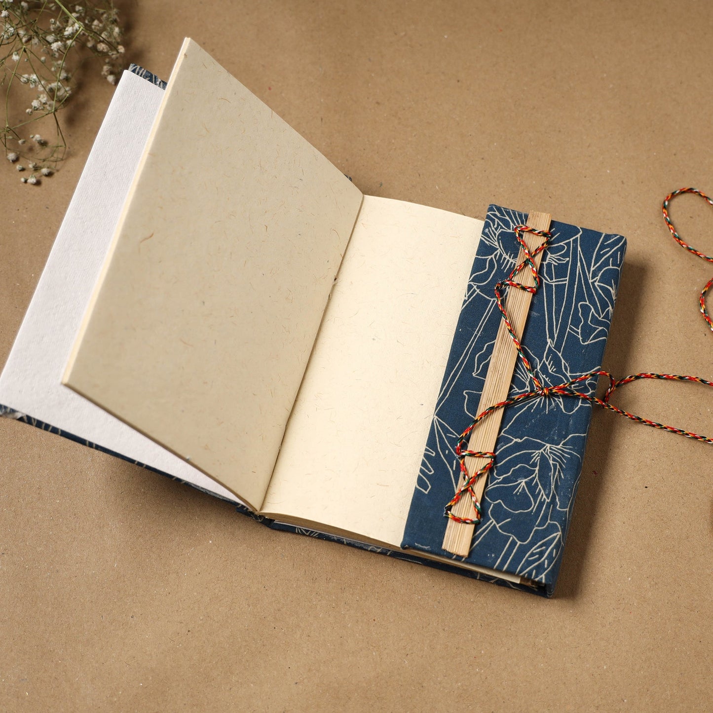 Bindaas fabric cover handmade paper notebook with thread