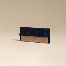 Handcrafted ikat fabric jute clutch / wallet by chhoti si