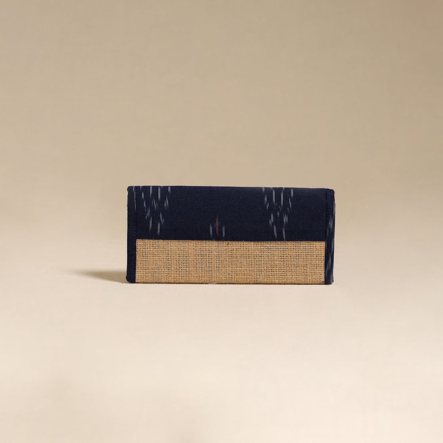 Handcrafted ikat fabric jute clutch / wallet by chhoti si