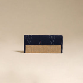 Handcrafted ikat fabric jute clutch / wallet by chhoti si