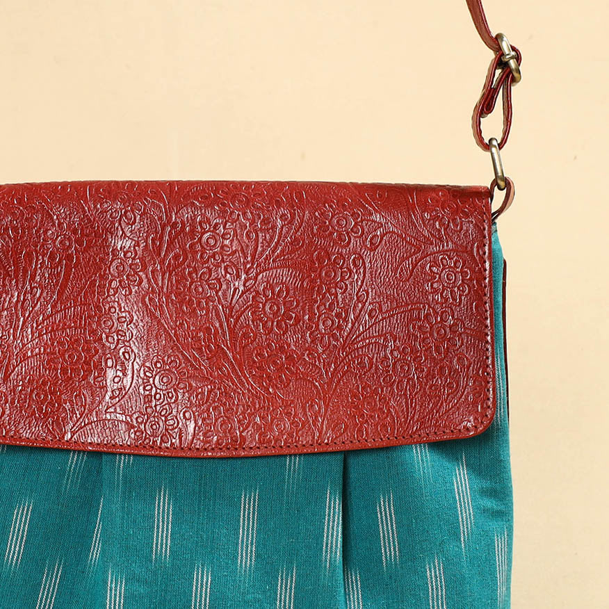 Blue Handcrafted Ikat Fabric Sling Bag with Embossed Leather Flap