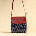 Buy Handcrafted Ikat Fabric Sling Bag with Embossed Leather Flap Online at iTokri.com
