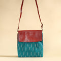 Blue Handcrafted Ikat Fabric Sling Bag with Embossed Leather Flap