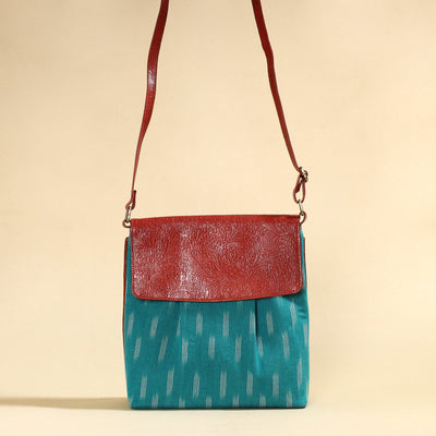 Blue Handcrafted Ikat Fabric Sling Bag with Embossed Leather Flap