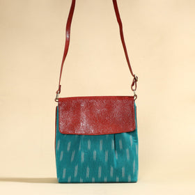 Blue Handcrafted Ikat Fabric Sling Bag with Embossed Leather Flap