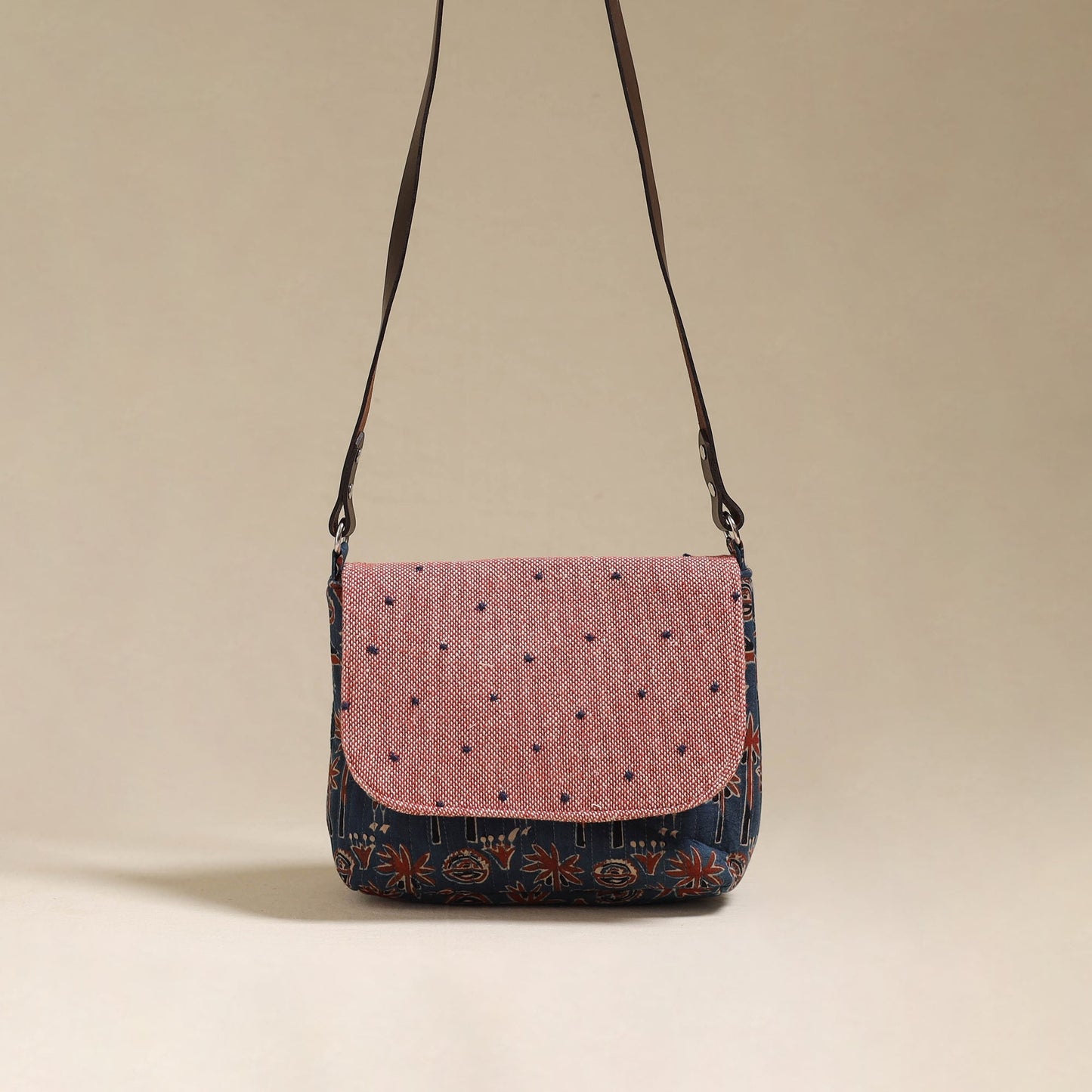 Handcrafted quilted ajrakh block printed fabric sling bag
