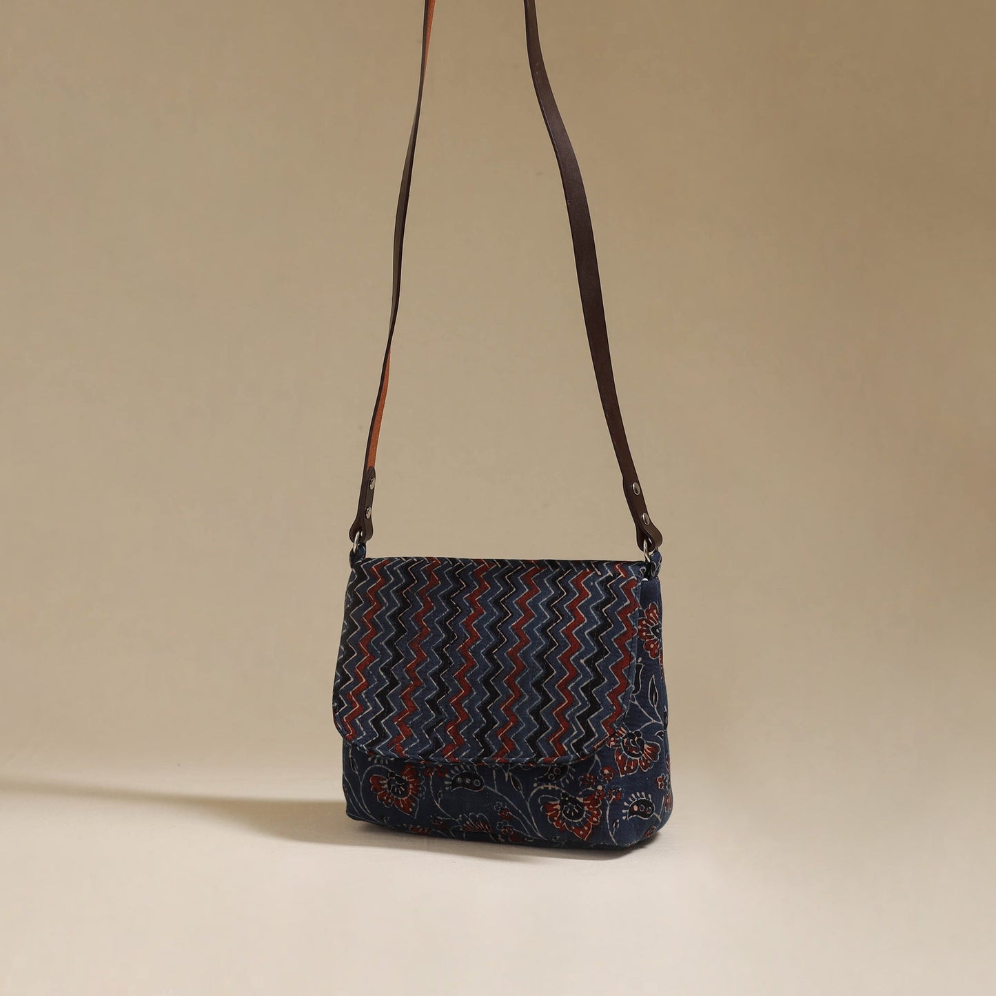 Handcrafted quilted ajrakh block printed fabric sling bag