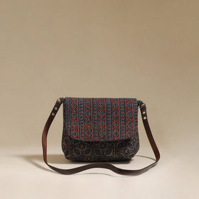 Handcrafted quilted ajrakh block printed fabric sling bag