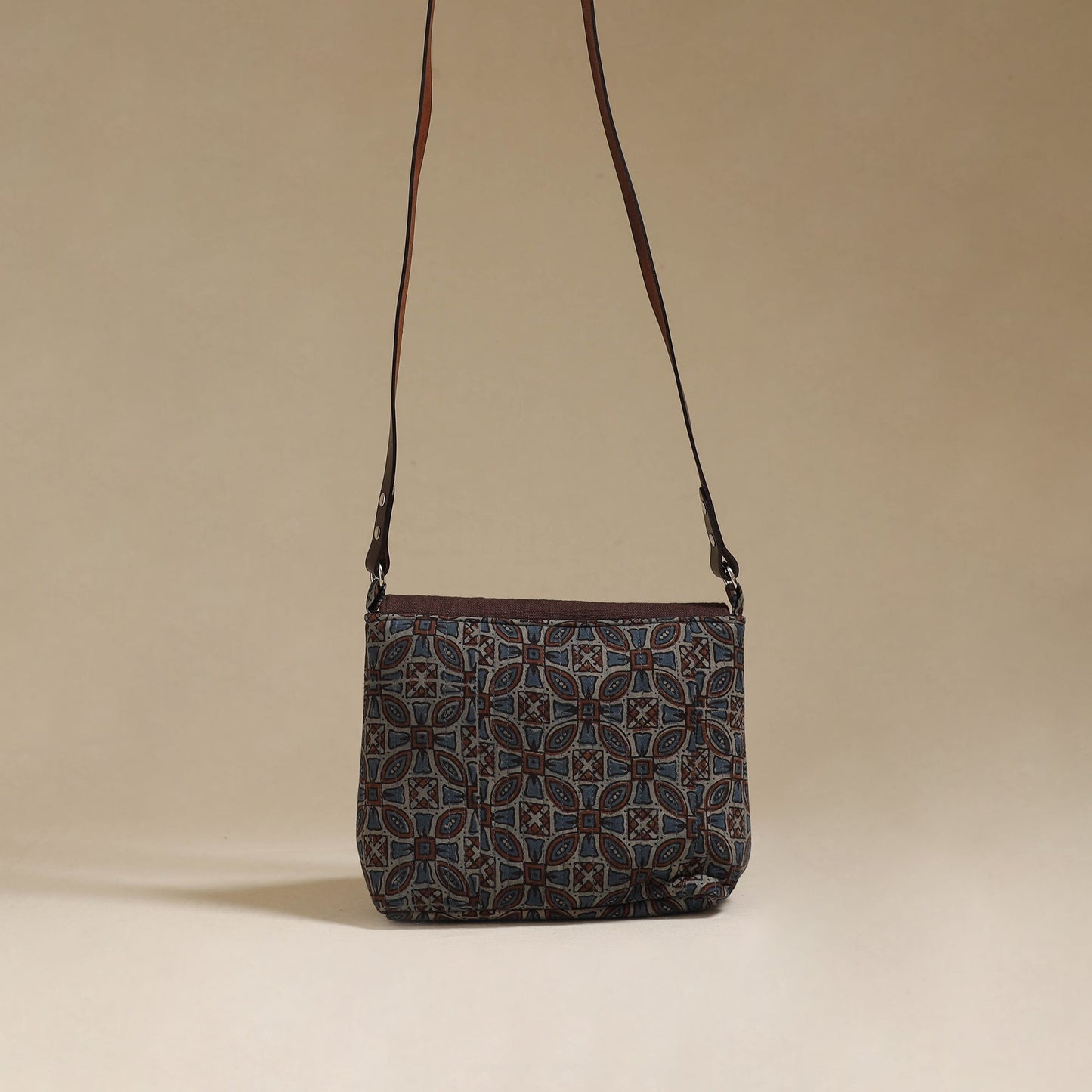Handcrafted quilted ajrakh block printed fabric sling bag