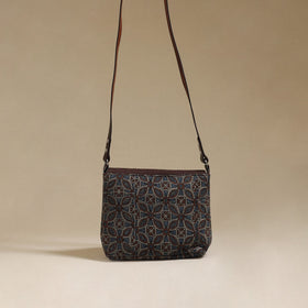 Handcrafted quilted ajrakh block printed fabric sling bag