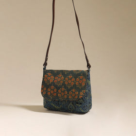 Handcrafted quilted ajrakh block printed fabric sling bag