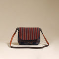 Handcrafted quilted ajrakh block printed fabric sling bag