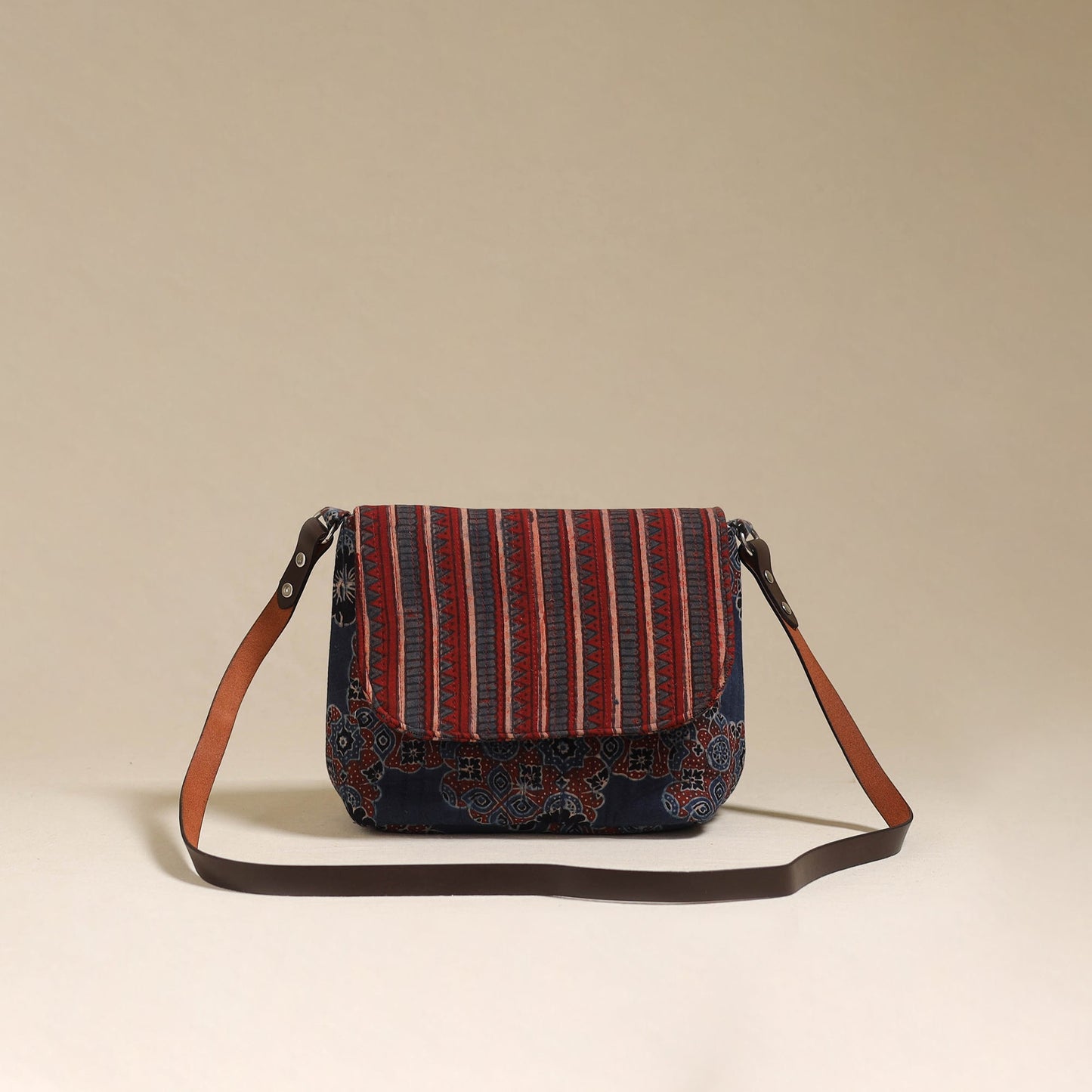 Handcrafted quilted ajrakh block printed fabric sling bag