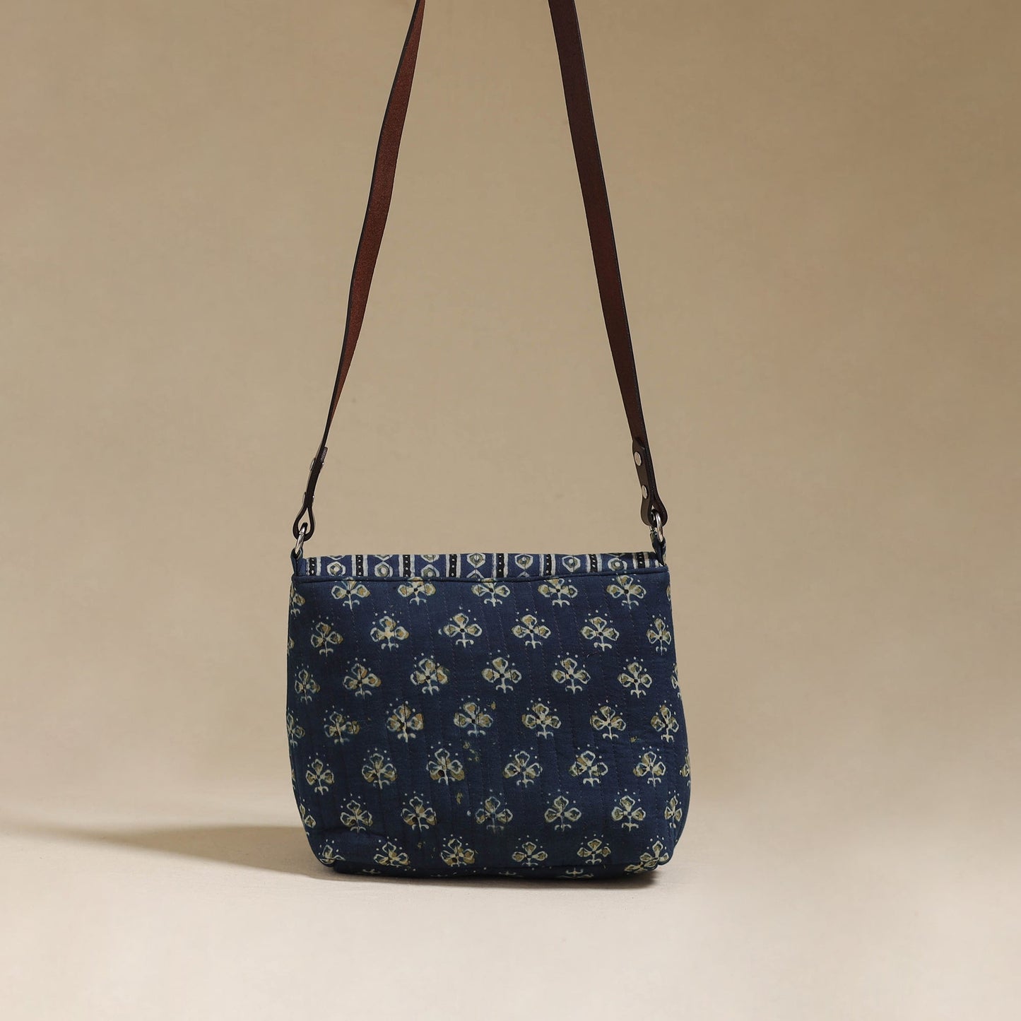 Handcrafted quilted ajrakh block printed fabric sling bag