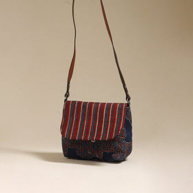 Handcrafted quilted ajrakh block printed fabric sling bag