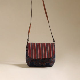 Handcrafted quilted ajrakh block printed fabric sling bag