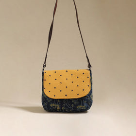 Handcrafted quilted ajrakh block printed fabric sling bag
