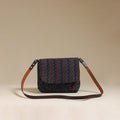 Handcrafted quilted ajrakh block printed fabric sling bag