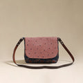 Handcrafted quilted ajrakh block printed fabric sling bag