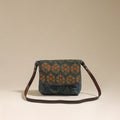 Handcrafted quilted ajrakh block printed fabric sling bag