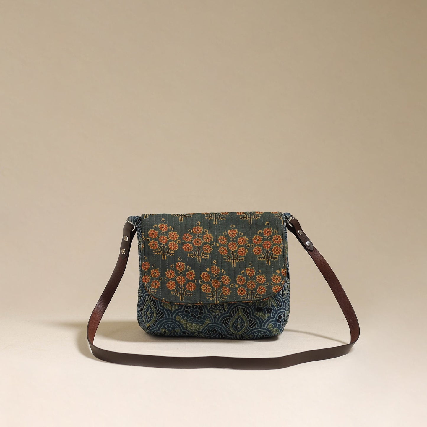 Handcrafted quilted ajrakh block printed fabric sling bag