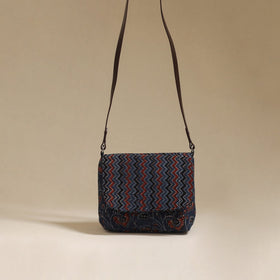 Handcrafted quilted ajrakh block printed fabric sling bag
