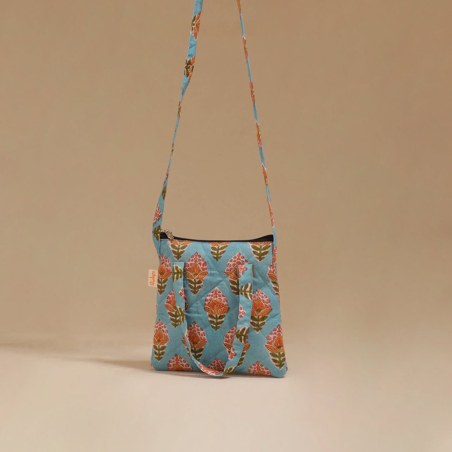 Handcrafted quilted sling bag 11