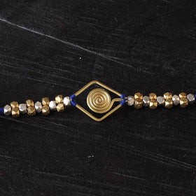 Handcrafted tribal dokra brass thread rakhi 09