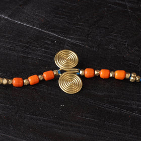 Handcrafted tribal dokra brass thread rakhi 10