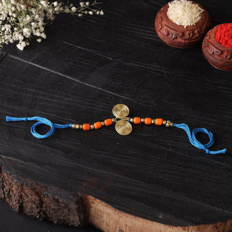 Handcrafted tribal dokra brass thread rakhi 10