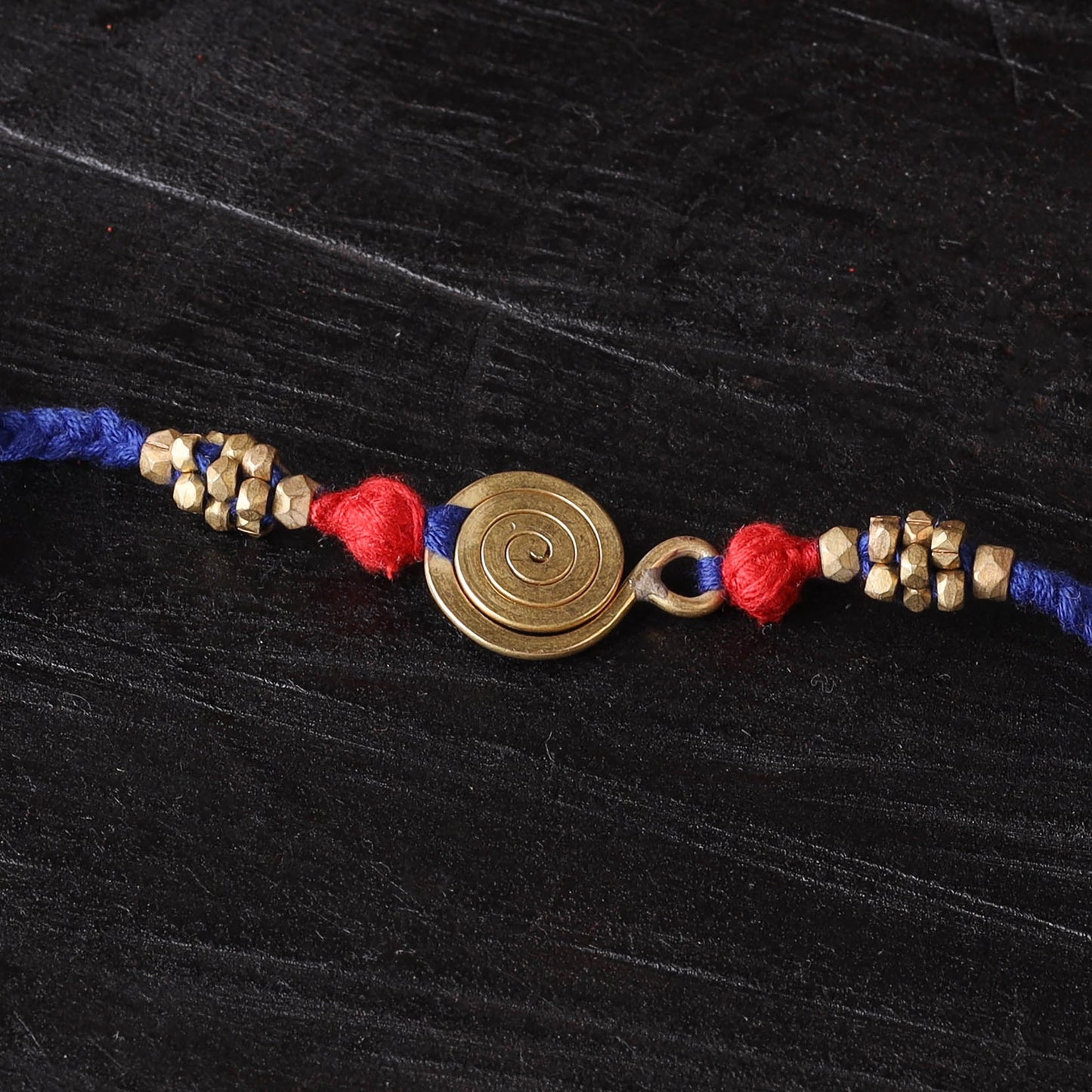 Handcrafted tribal dokra brass thread rakhi 36