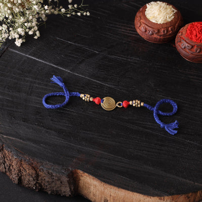 Handcrafted tribal dokra brass thread rakhi 36