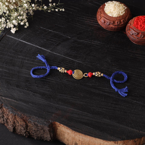 Handcrafted tribal dokra brass thread rakhi 36
