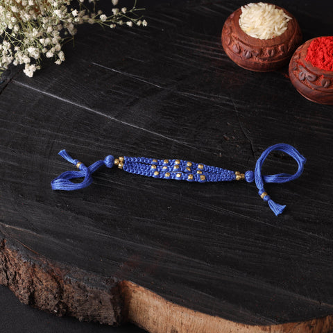 Handcrafted tribal dokra brass thread rakhi 37