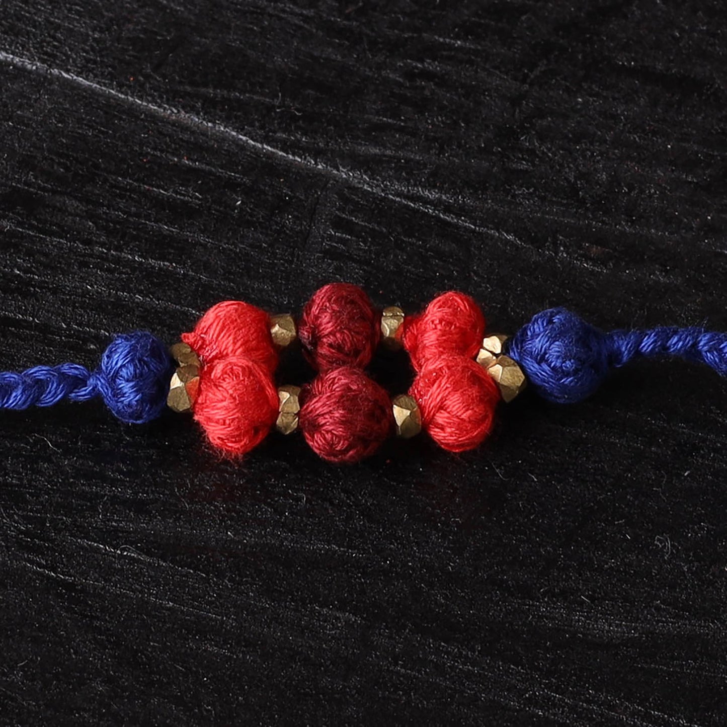 Handcrafted tribal dokra brass thread rakhi 50