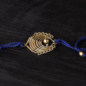 Handcrafted tribal dokra brass thread rakhi 60