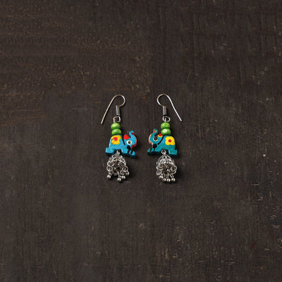 Blue - raahi german silver jhumki earrings with wooden