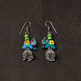 Blue - raahi german silver jhumki earrings with wooden