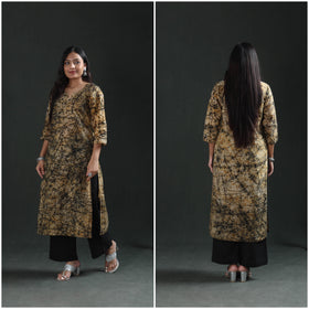 Side and back frames of the beige cotton kurta, full length, black web all round