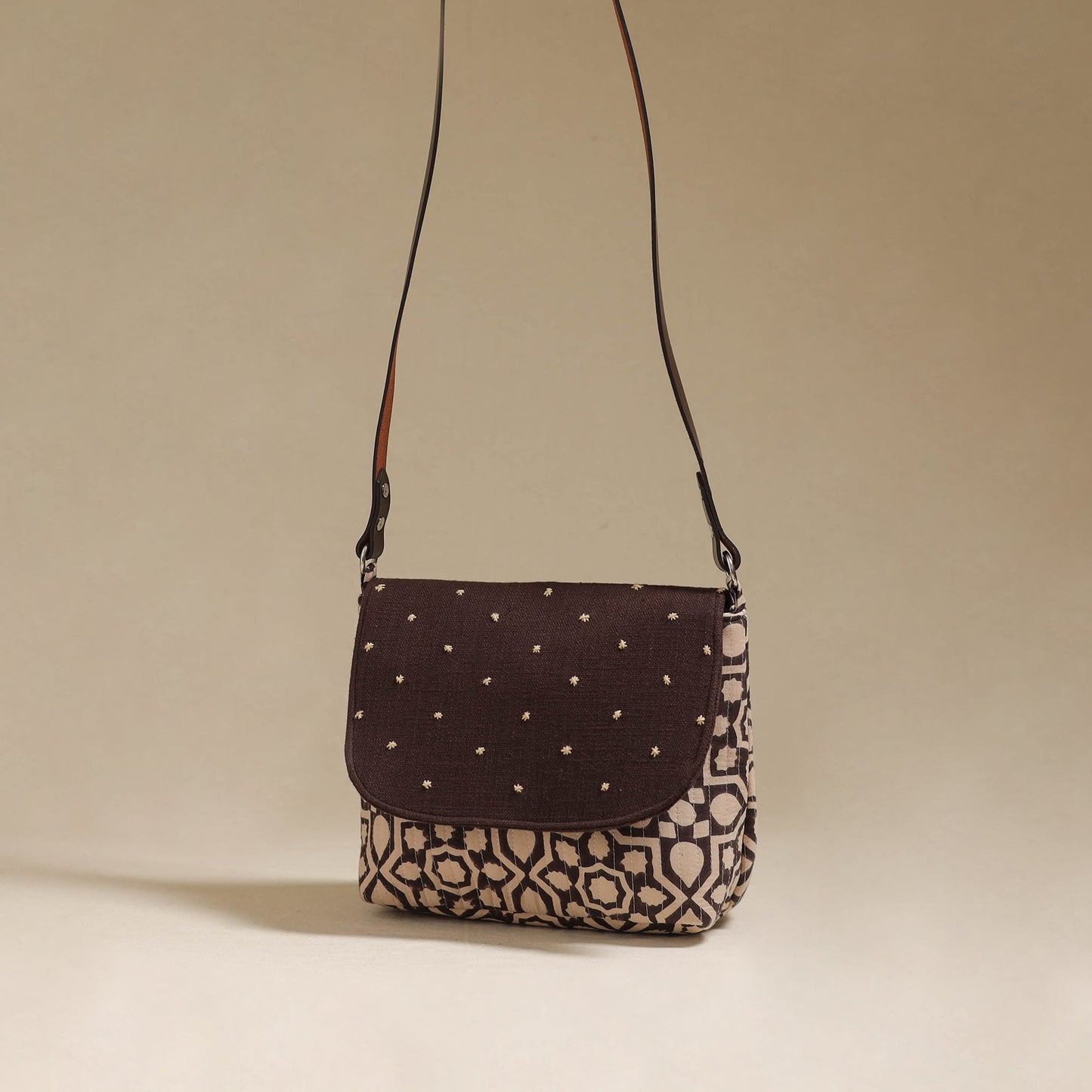 Handcrafted quilted ajrakh block printed fabric sling bag