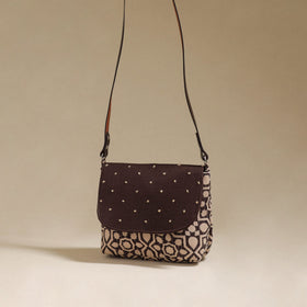 Handcrafted quilted ajrakh block printed fabric sling bag